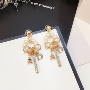 Women's pearl earrings